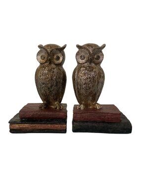 Vintage Owl Bookends On A Book Stack